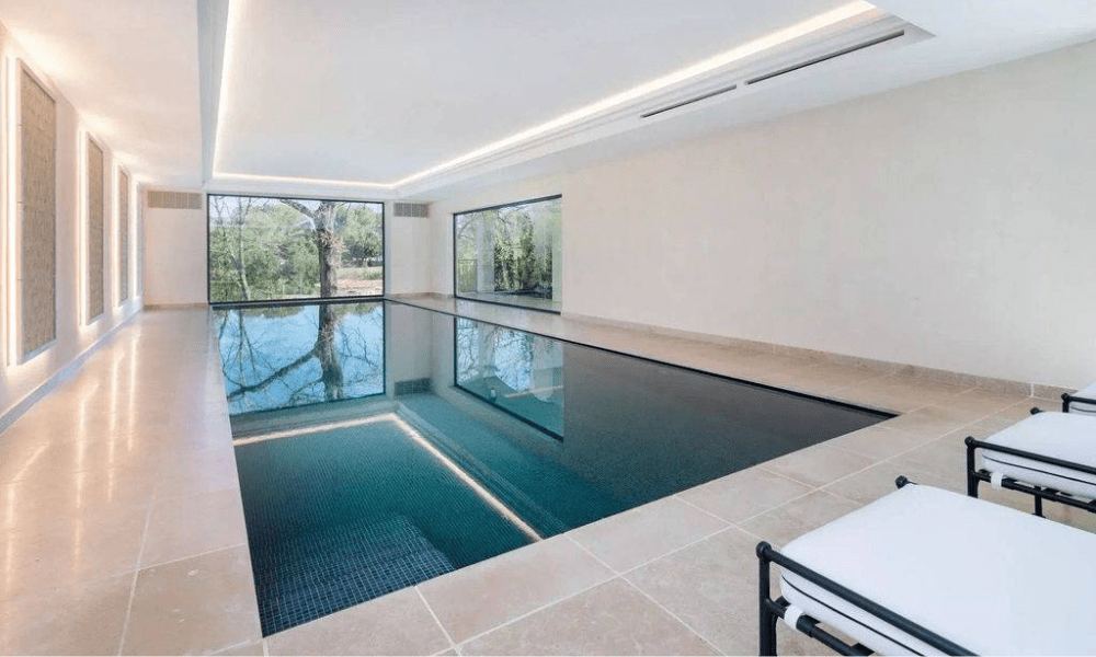 Pool terrace with sunbeds and Mediterranean view